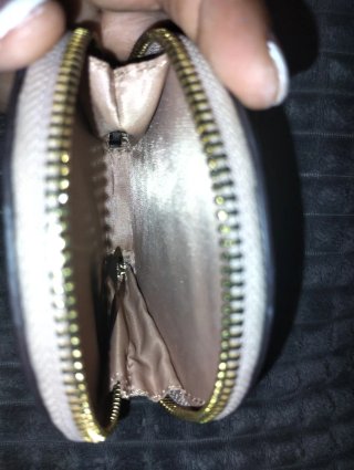 Monedero redondo Guess beige