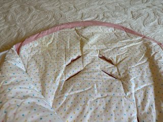 Saco bebé tiburón rosa Baby Bites