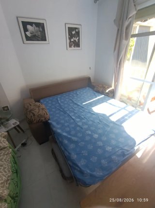 Sofá Cama Beige y Marrón en excelente estado.
