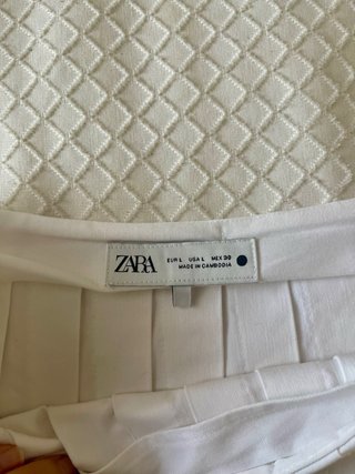 Falda Zara blanca midi vuelo y pliegues talla L