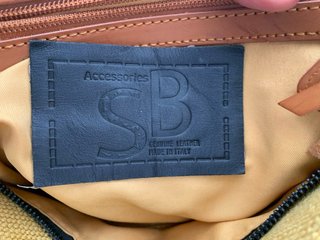 Borsa tela e pelle gialla con frange