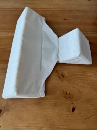 Cojín antivuelco para bebé