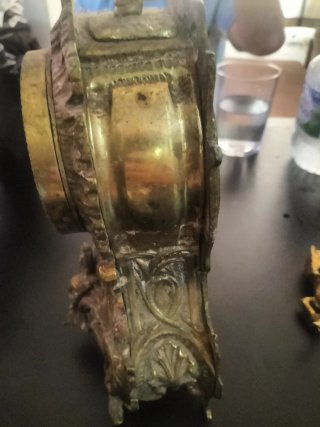 Reloj de mesa vintage con figura ecuestre