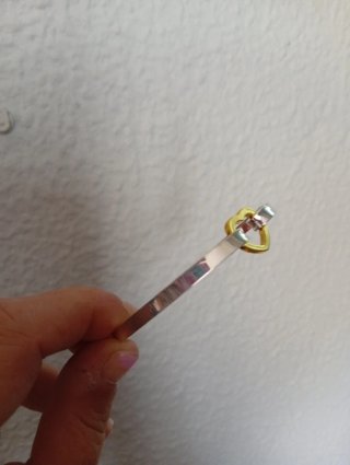 Pulsera de plata con corazón dorado