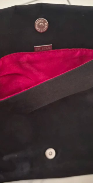 Pochette Pupa nera con stelle
