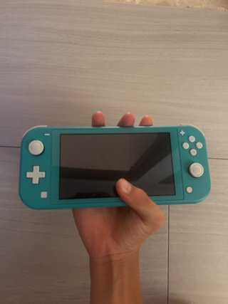 Nintendo Switch Lite azul con caja y funda