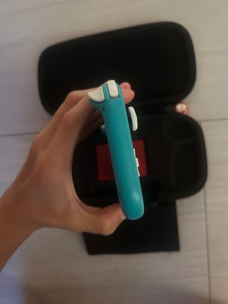 Nintendo Switch Lite azul con caja y funda