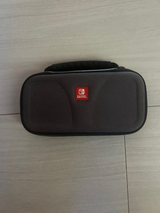 Nintendo Switch Lite azul con caja y funda