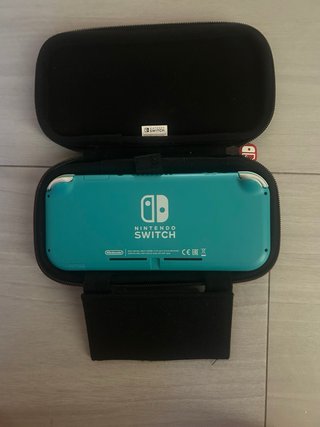 Nintendo Switch Lite azul con caja y funda