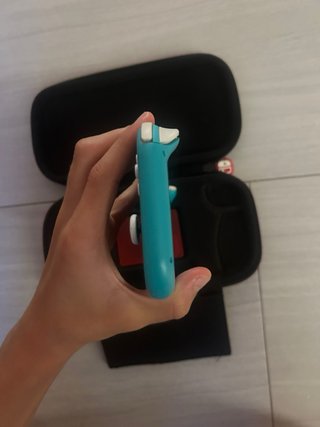 Nintendo Switch Lite azul con caja y funda