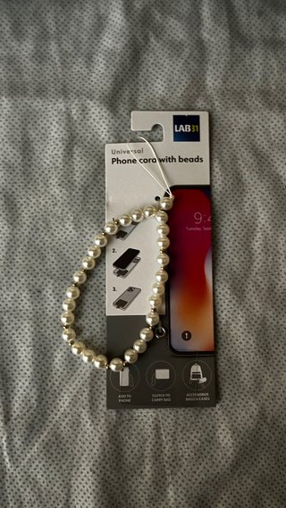 Cordón para móvil con perlas