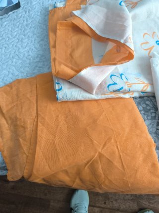 Juego de sábanas naranja y blanco cama 1,05