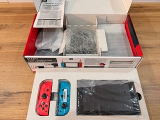 Nintendo Switch Completa Azul y Rojo