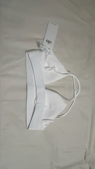 Sujetador deportivo Alo Yoga blanco. Es talla S