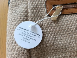Bolso de mano beige y multicolor