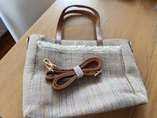 Bolso de mano beige y multicolor