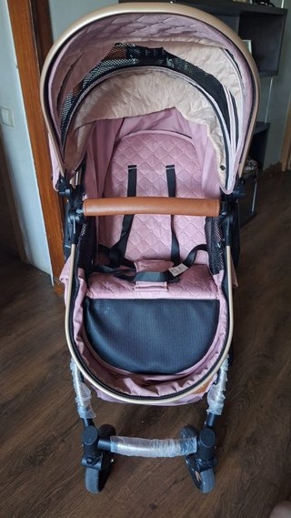 Carrito de bebé niña rosa