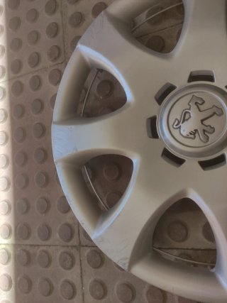 Tapacubos Peugeot 107