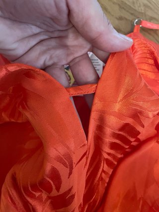 Mono corto Guess naranja con estampado