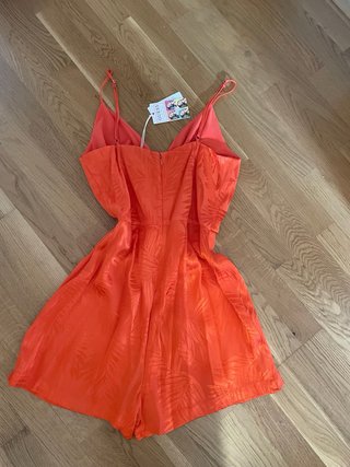 Mono corto Guess naranja con estampado