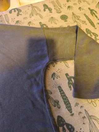 Sudadera gris oversize con estrella