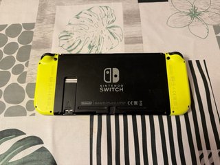 Nintendo Switch Amarilla + Ring Fit Adventure
