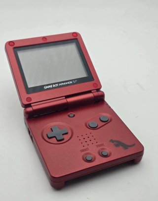 Nintendo Game Boy Advance SP a tema Rosso Groudon