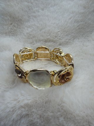 Pulsera elástica dorada y marrón