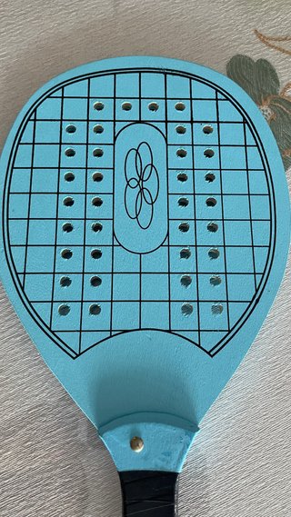 Palas de playa nuevas con pelota