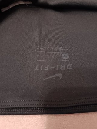 Leggings Nike negros con detalle lateral