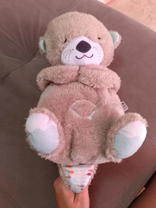 Nutria de peluche para dormir
