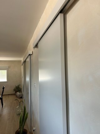 3 Puertas correderas con guía en cada puerta