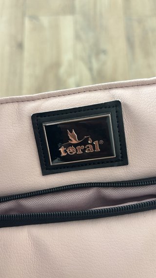 Cochecito bebé rosa de la marca toral como nuevo ,