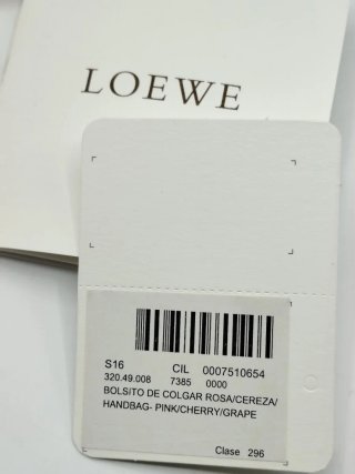 Caja Loewe con accesorios y bolsa guardapolvo