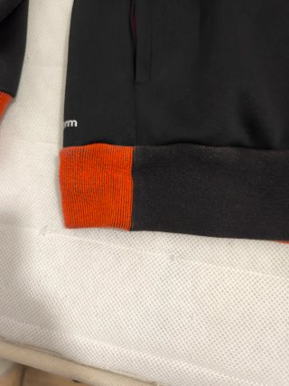 Chaqueta chándal Adidas negra y naranja