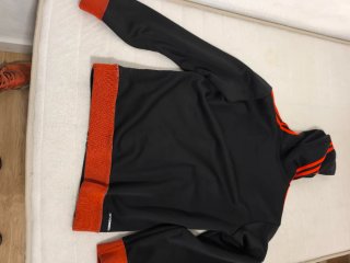 Chaqueta chándal Adidas negra y naranja