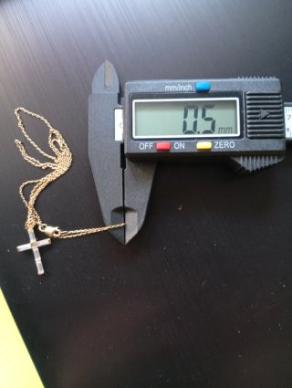 Cadena y cruz de oro