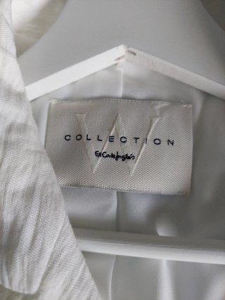 Chaqueta blanca roto
