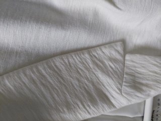 Chaqueta blanca roto