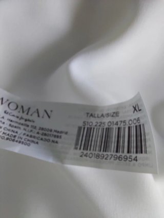 Chaqueta blanca roto