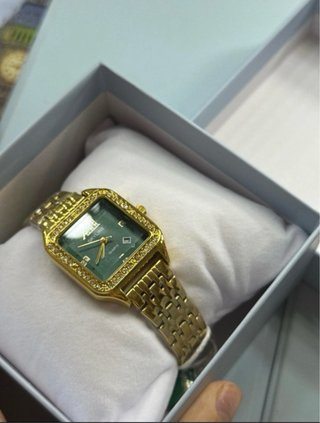 Reloj SKYLINE dorado con detalles