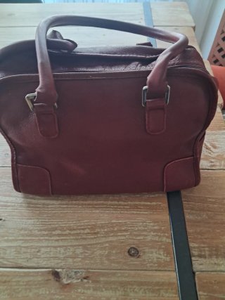 Bolso de mano de cuero burdeos
