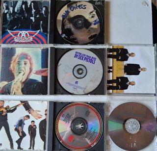 CDs Aerosmith Sex Pistols INXS Moby
