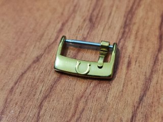 Fibbia Omega Oro