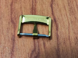 Fibbia Omega Oro