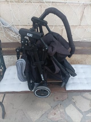 Silla de paseo negra con capota gris