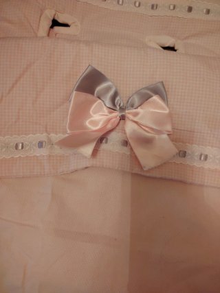 Saco Maxi-Cosi rosa con lazo