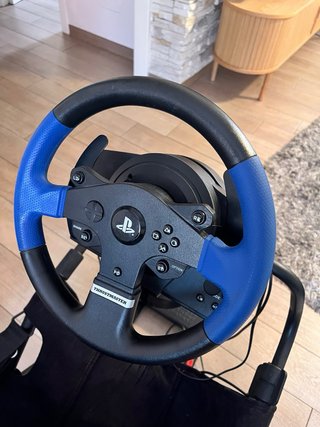 Silla gaming Playseat con volante e pedali