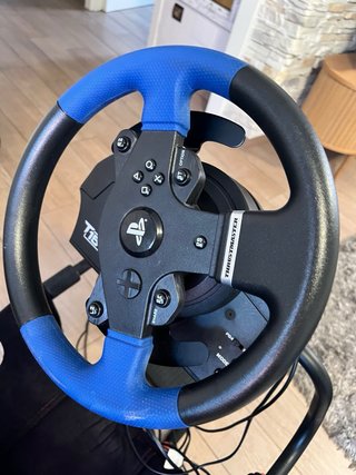 Silla gaming Playseat con volante e pedali