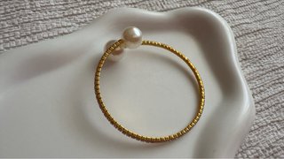 Bracciale dorato perle resina e strass